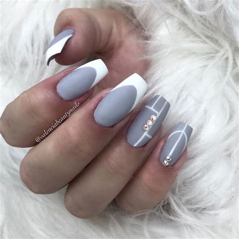 nails grey and white|gray nails with accent nail.